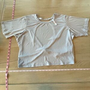 Fabletics reflex twist back Light blue Short Sleeve Tee